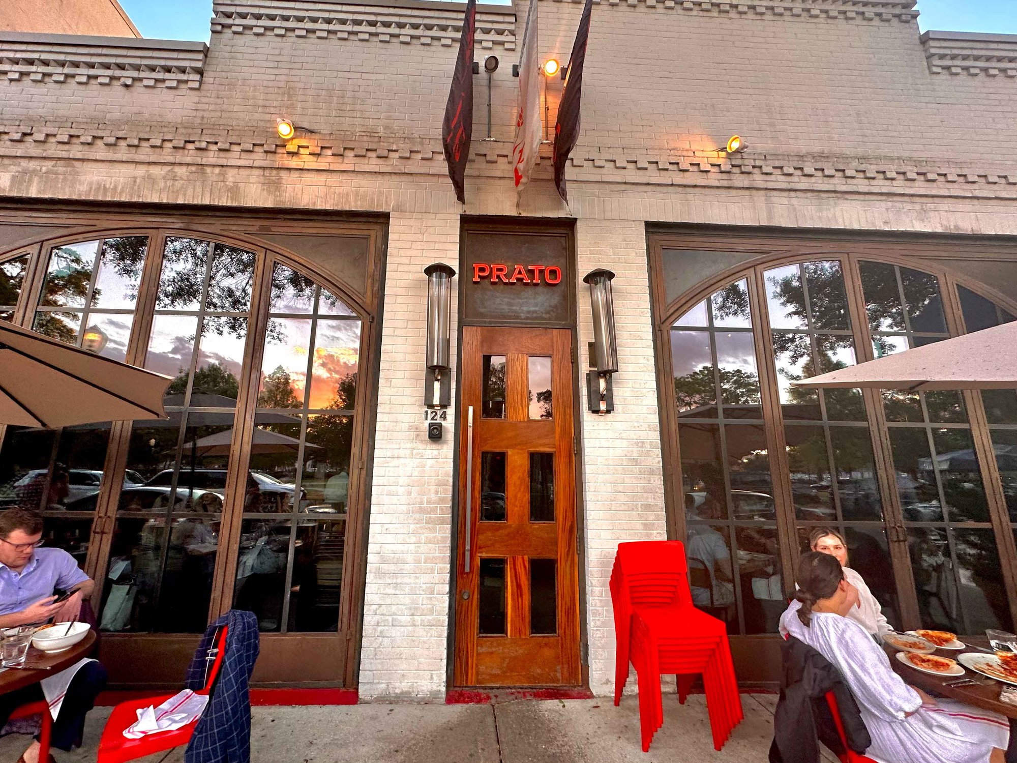 Exterior shot of Prato and outdoor diners